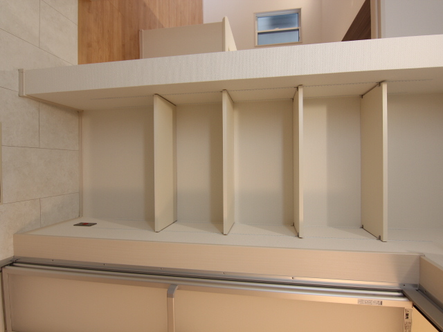 洗面所1号棟　収納に便利な4段可動棚